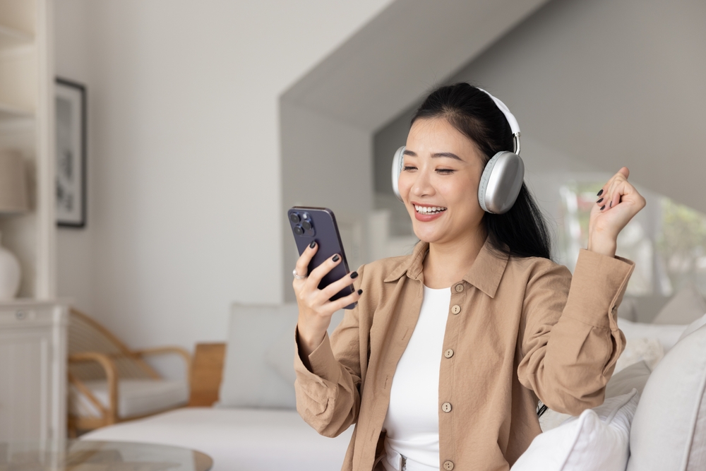 A woman enjoying connectivity after comparing eSIM vs SIM card in Japan